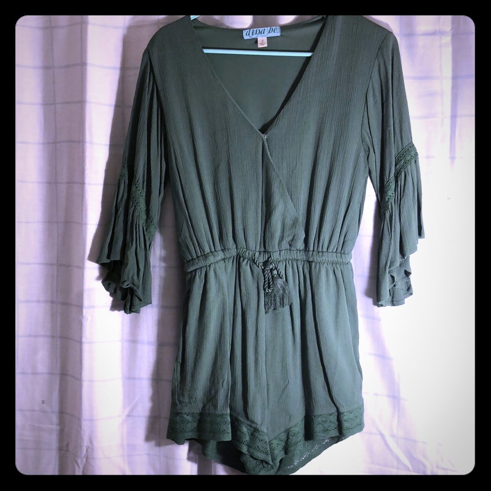 Olive green romper with pockets and cinched waist